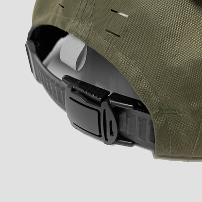 Utility hat made of durable waterproof coated ECOPAK™ fabric, with multiple laser-cut slits and ventilation openings, quick release adjustment strap, and reflexive tab for night time visibility.